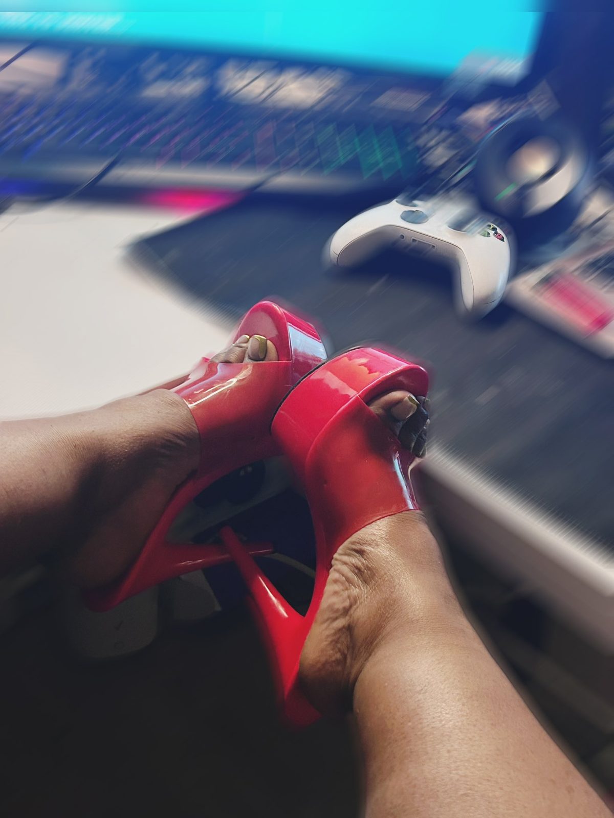 Red platform heels at the desk
